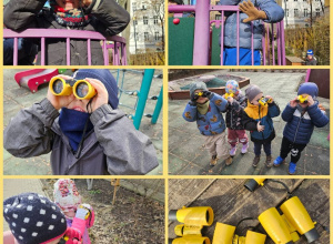 Dzieci obserwujące przyrodę przez lornetki.